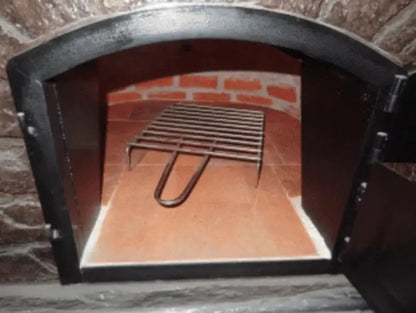 Authentic Pizza Ovens BBQ grill rack set on the floor inside a Maximus stainless pizza oven with the handle toward the door