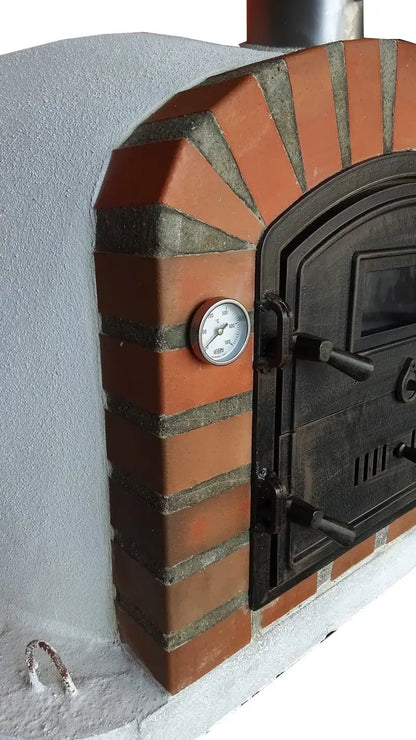 Close view of the Lisboa Rustic Arch brick arch, Celsius thermometer, and cast aluminum door hinges and latches