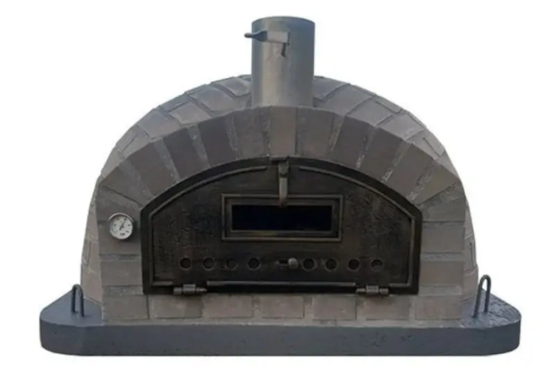Authentic Pizza Ovens Lume Largo Tudo pizza oven straight on, gray cast stone in a brick pattern over the full low dome with the drop down door latched and the thermometer beside it