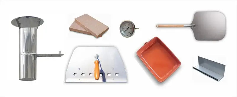 Everything included with the Maximus Mobile pizza oven laid out: stainless chimney with damper, spare floor tiles, dial thermometer, stainless peel, stainless door, ceramic baking dish, and ash and wood holder