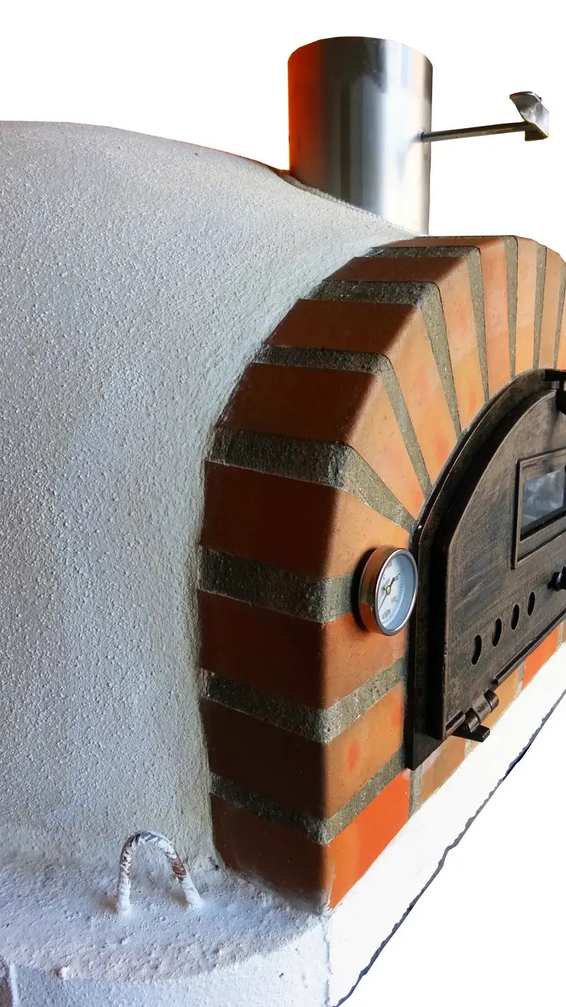 Close side view of a Pizzaioli Rustic Arch where the white render dome meets the tumbled brick arch, thermometer and door edge visible