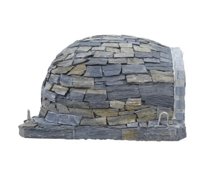 Rear and side view of an Authentic Pizza Ovens Pizzaioli Stone Finish showing hand laid slate pieces covering the entire dome down to the base slab