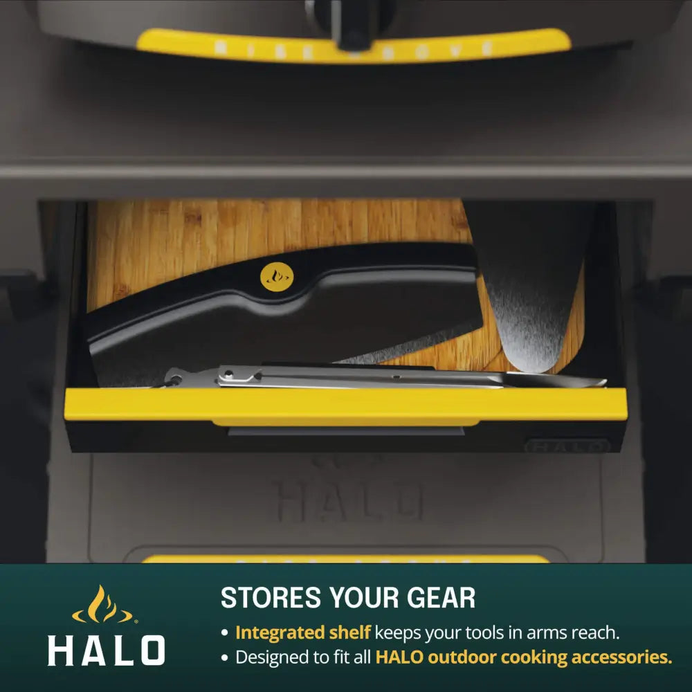 Hidden drop-down drawer on the Halo Countertop Cart storing pizza cutter, peel, and tongs