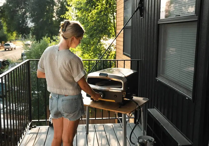 Cooking on the Halo Versa 16 pizza oven on a small apartment balcony