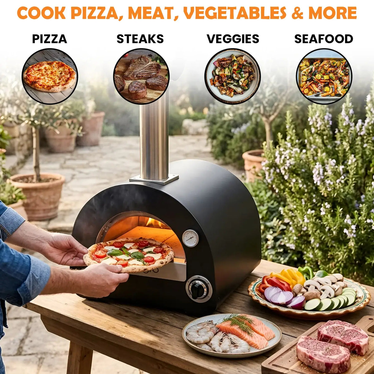 Pizza coming out of the ItaliaForno Allegro on a patio table with steaks, seafood and vegetables ready