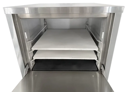 Omcan 48080 countertop pizza oven with the door open showing two ceramic baking stones on two rack levels